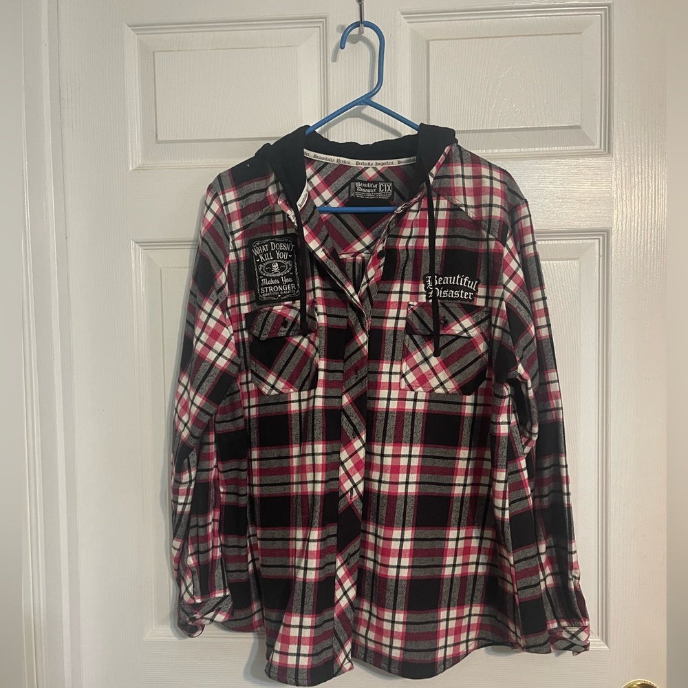 Beautiful Disaster flannel jacket with drawstring hood.